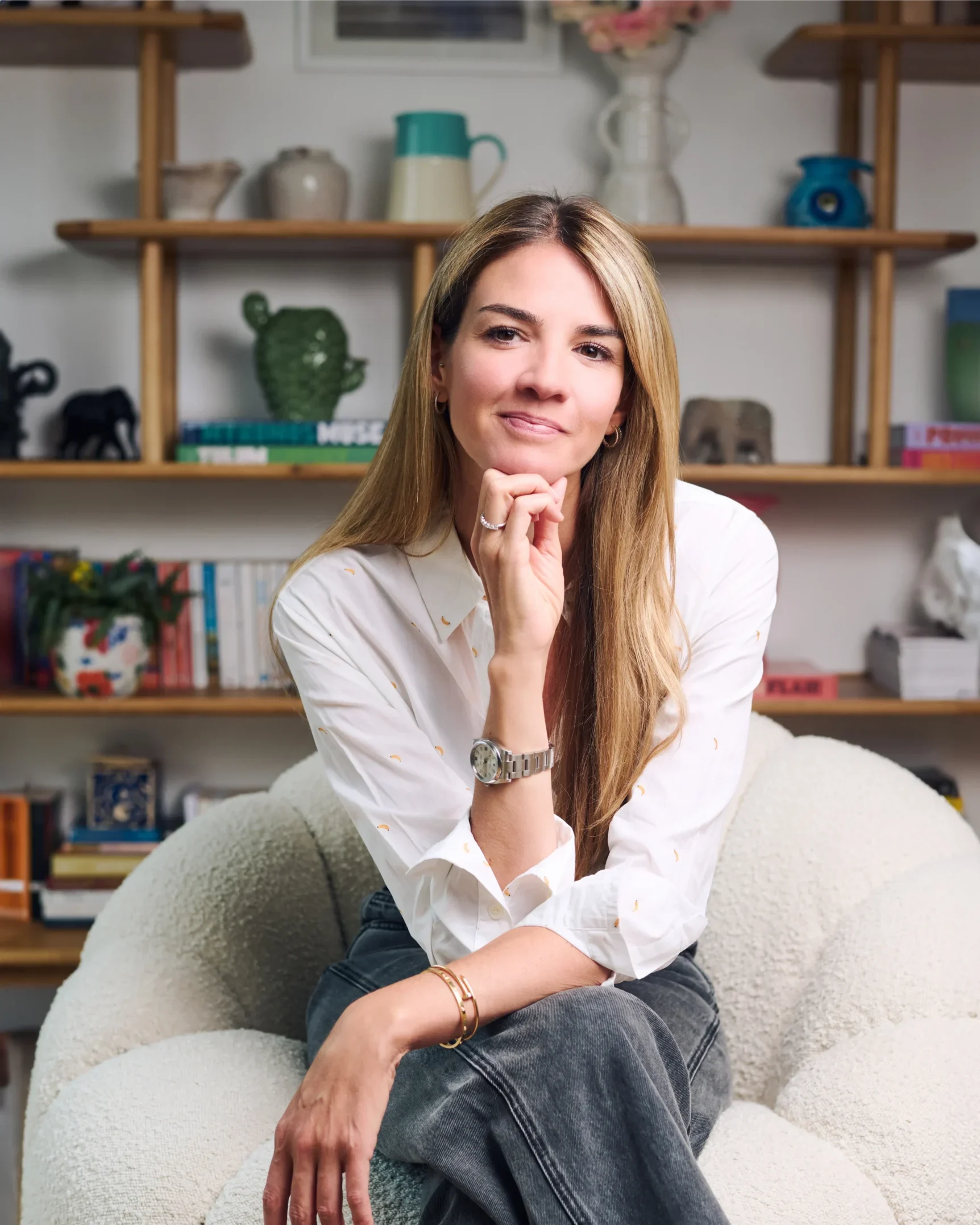 Professional life coach in London, Olivia Vaughan, relaxing on a chair.
